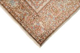 Backside of handmade 1920s Istanbul Silk rug showing knot structure and weave density