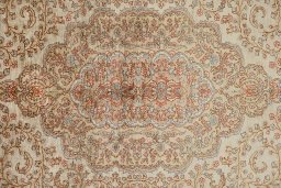 Central medallion detail of 1920s Istanbul Silk rug from Turkey