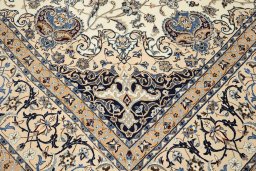 Corner detail of 1980s Nain Silk rug showing border pattern and Wool pile