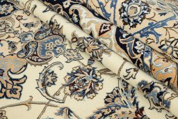 Close-up detail of 1980s Nain Silk rug from Iran / Persia showing Wool weave