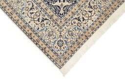 Central medallion detail of 1980s Nain Silk rug from Iran / Persia