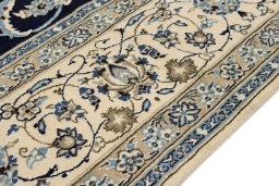 Central medallion detail of 1990s Nain Silk rug from Iran / Persia
