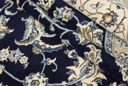 Close-up detail of 1990s Nain Silk rug from Iran / Persia showing Wool weave