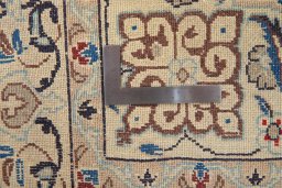 Close-up detail of 1990s Nain Silk rug from Iran / Persia showing Wool weave