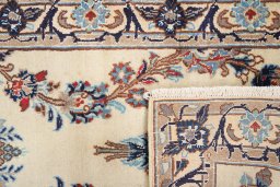Close-up detail of 2000s Nain Silk rug from Iran / Persia showing Wool weave