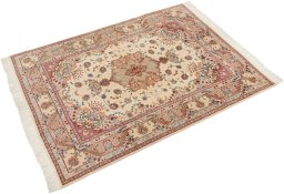 Corner detail of New Tabriz Silk rug showing border pattern and Wool pile