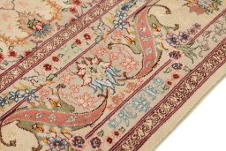 Central medallion detail of New Tabriz Silk rug from Iran / Persia