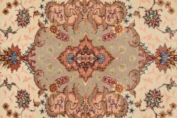 Close-up detail of New Tabriz Silk rug from Iran / Persia showing Wool weave