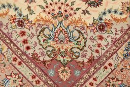 Full view of New Tabriz Silk rug from Iran / Persia, 193 × 147 cm in Cream tones