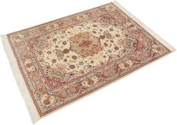Corner detail of New Tabriz Silk rug showing border pattern and Wool pile