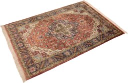 Corner detail of 1960s Tabriz Silk rug showing border pattern and Silk pile
