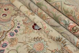 Corner detail of New Tabriz Silk rug showing border pattern and Wool pile