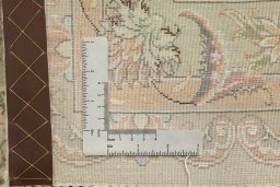 Close-up detail of New Tabriz Silk rug from Iran / Persia showing Wool weave