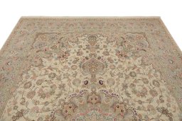 Backside of handmade New Tabriz Silk rug showing knot structure and weave density