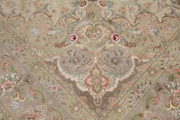 Central medallion detail of New Tabriz Silk rug from Iran / Persia