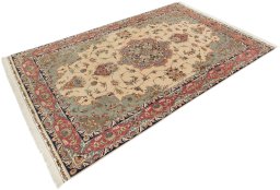 Corner detail of 1990s Tabriz Silk rug showing border pattern and Wool pile
