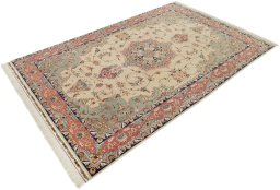Close-up detail of 1990s Tabriz Silk rug from Iran / Persia showing Wool weave
