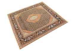 Corner detail of 1990s Tabriz Silk rug showing border pattern and Wool pile