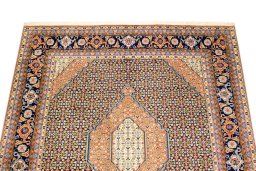 Surface texture of 1990s Tabriz Silk rug with natural Wool and intricate pattern