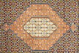 Central medallion detail of 1990s Tabriz Silk rug from Iran / Persia