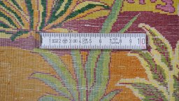 Close-up detail of 1990s Tabriz Silk rug from Iran / Persia showing Wool weave