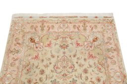 Surface texture of 1990s Tabriz Silk rug with natural Wool and intricate pattern