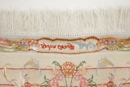 Close-up detail of 1990s Tabriz Silk rug from Iran / Persia showing Wool weave