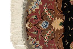 Central medallion detail of New Tabriz Silk rug from Iran / Persia