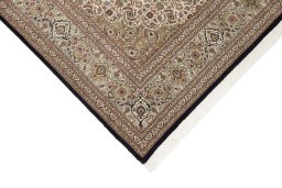 Surface texture of New Tabriz Silk rug with natural Wool and intricate pattern