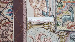 Corner detail of New Tabriz Silk rug showing border pattern and Wool pile