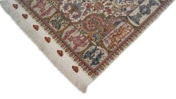 Surface texture of New Tabriz Silk rug with natural Wool and intricate pattern
