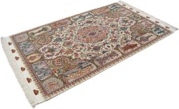 Corner detail of New Tabriz Silk rug showing border pattern and Wool pile