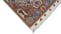Backside of handmade New Tabriz Silk rug showing knot structure and weave density