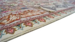 Central medallion detail of New Tabriz Silk rug from Iran / Persia