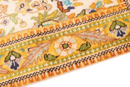 Backside of handmade 2000s Tabriz Silk rug showing knot structure and weave density