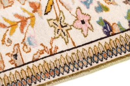 Backside of handmade 2005s Tabriz Silk rug showing knot structure and weave density