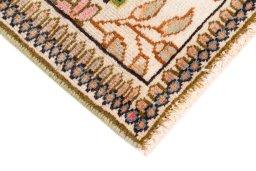 Central medallion detail of 2005s Tabriz Silk rug from Iran / Persia