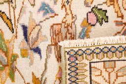 Close-up detail of 2005s Tabriz Silk rug from Iran / Persia showing Wool weave