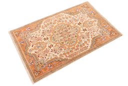 Corner detail of 1998s Tabriz Silk rug showing border pattern and Wool pile