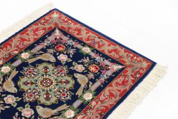 Surface texture of New Tabriz Silk rug with natural Wool and intricate pattern