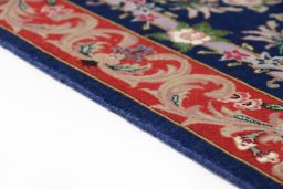 Central medallion detail of New Tabriz Silk rug from Iran / Persia
