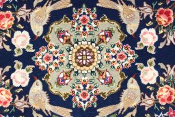 Close-up detail of New Tabriz Silk rug from Iran / Persia showing Wool weave