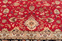 Surface texture of 2020s Tabriz Silk rug with natural Wool and intricate pattern