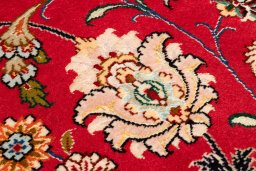 Close-up detail of 2020s Tabriz Silk rug from Iran / Persia showing Wool weave