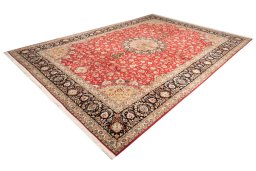 Corner detail of 2020s Tabriz Silk rug showing border pattern and Wool pile