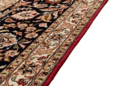 Close-up detail of 2020s Tabriz Silk rug from Iran / Persia showing Wool weave