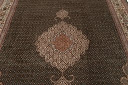 Corner detail of 2019s Tabriz Silk rug showing border pattern and Wool pile