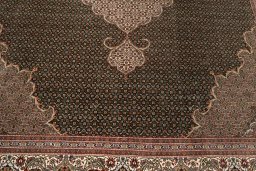 Close-up detail of 2019s Tabriz Silk rug from Iran / Persia showing Wool weave