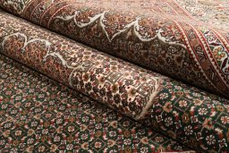Backside of handmade 2019s Tabriz Silk rug showing knot structure and weave density