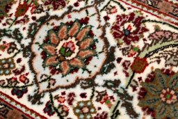 Central medallion detail of 2019s Tabriz Silk rug from Iran / Persia